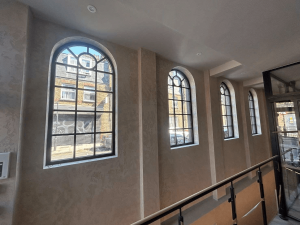 Arched black Crittall steel windows 